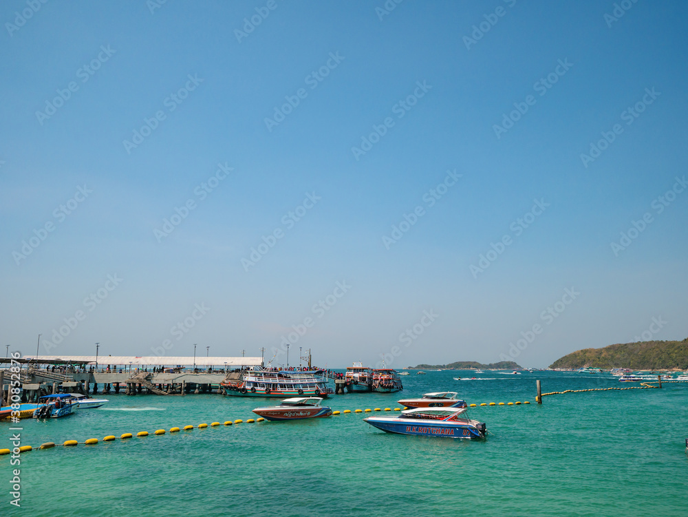 Tropical Idyllic Ocean and Boat on Koh lan Island in vacation time. Koh lan island is the Famous island near Pattaya city the Travel Destination in Thailand,Thailand holiday concept