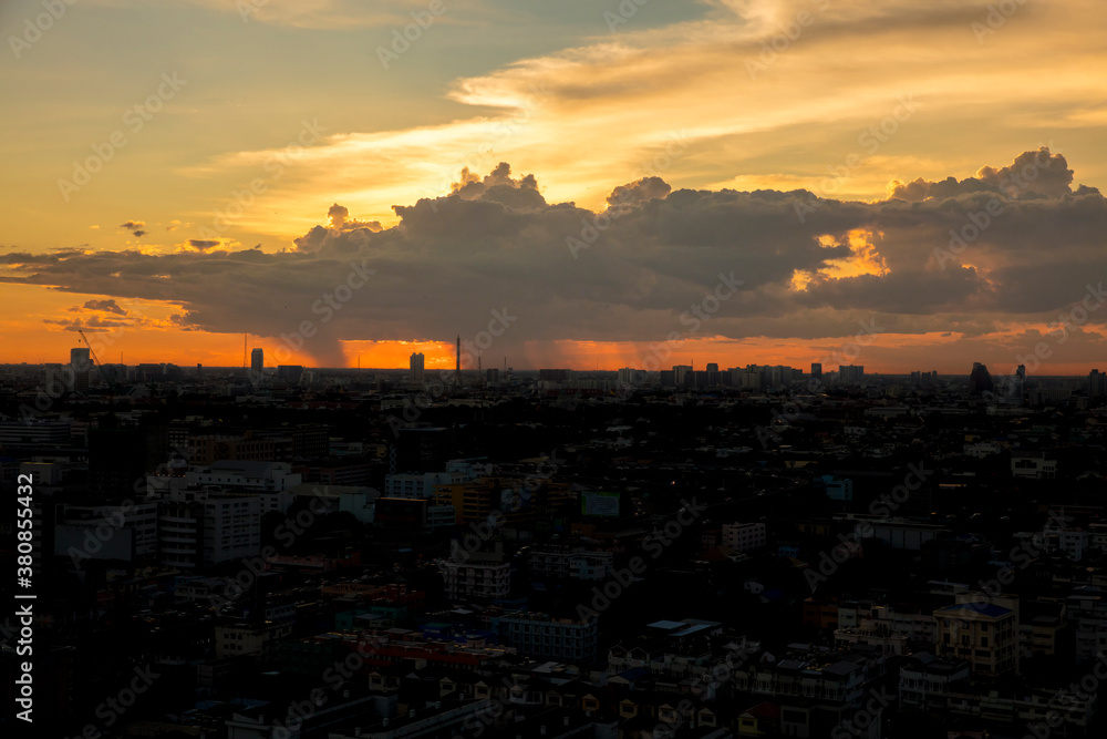 Aerial view of dramatic sunset or sunrise again cloudly sky over Bangkok city Thailand of Asian