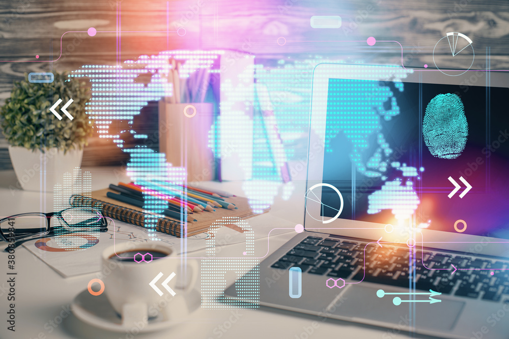 Double exposure of desktop with computer and world map hologram. International data network concept. Double exposure of desktop with computer and world map hologram. International data network concept.