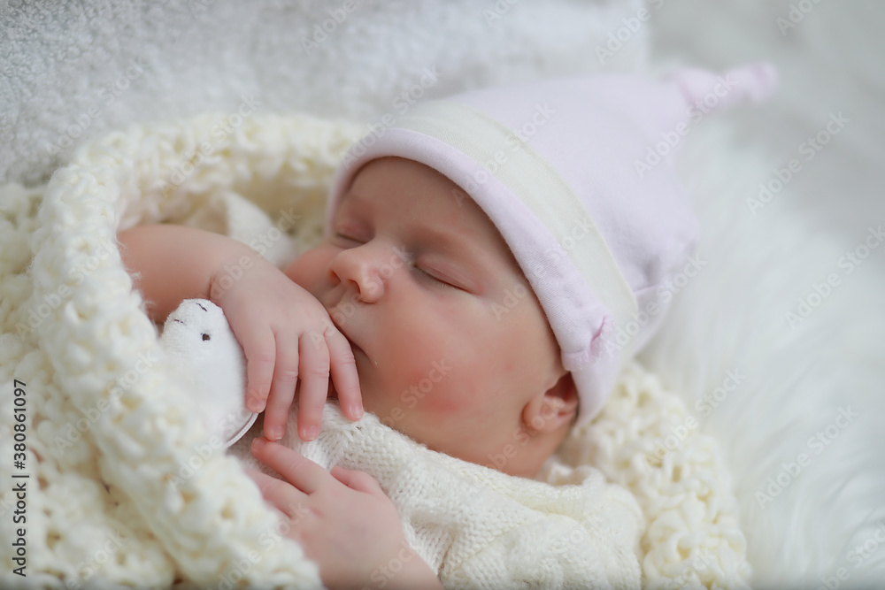Baby newborn sleeping wrapped up in a blanket Baby newborn sleeping wrapped up in a blanket