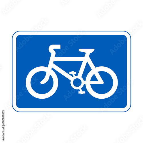 Cycle lane road sign. Route recommended for pedal cycles on main carriageway. Vector illustration of bicycles only traffic sign. Route for pedal bikes. White bike inside blue rectangle.