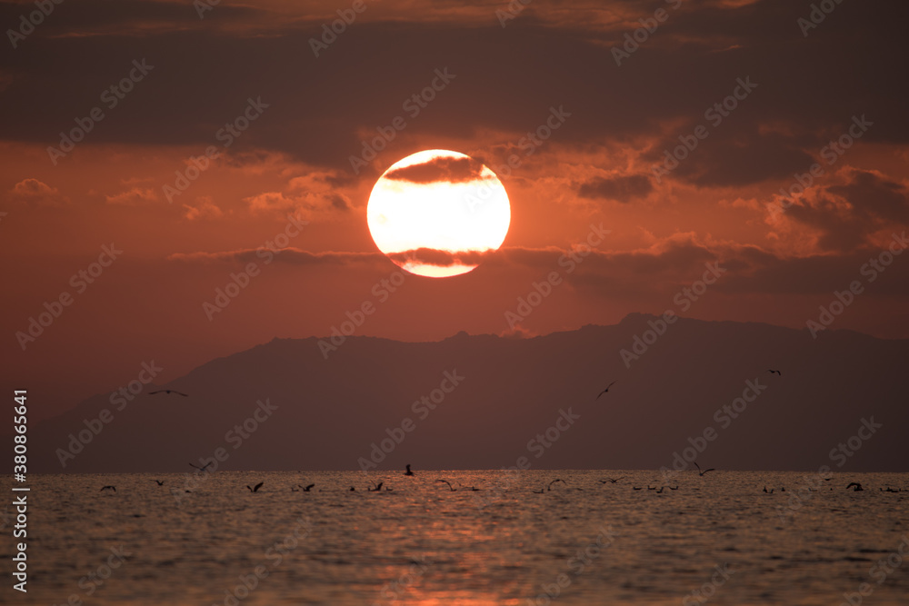 Setting sun on an empty beach, Sardinia Setting sun on an empty beach, Sardinia