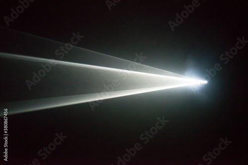 Illuminated beam of light from a projector
