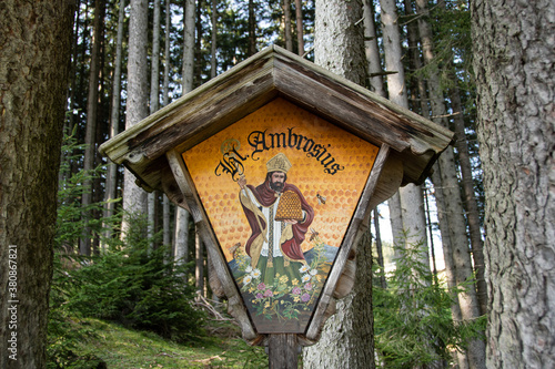 Tablou pe pânză Monument to St. Ambrose the patron saint of bees and beekeepers
