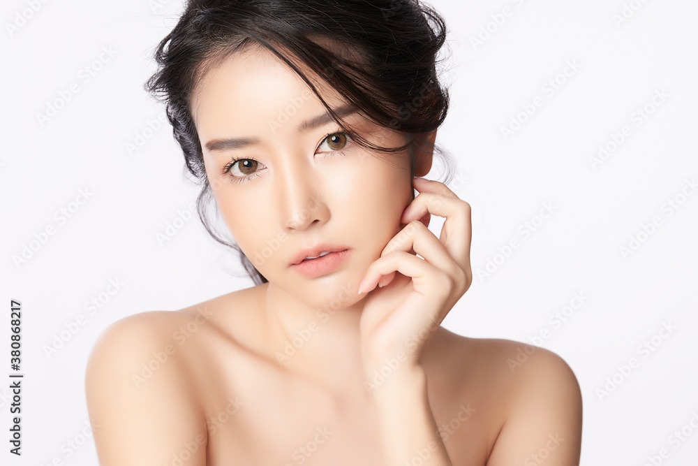 Beautiful young asian woman with clean fresh skin on white background, Face care, Facial treatment, Cosmetology, beauty and spa, Asian women portrait Beautiful young asian woman with clean fresh skin on white background, Face care, Facial treatment, Cosmetology, beauty and spa, Asian women portrait