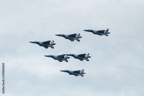 Singapore Air Force F15 fighter jets flying over the city during National Day celebration in August 2020