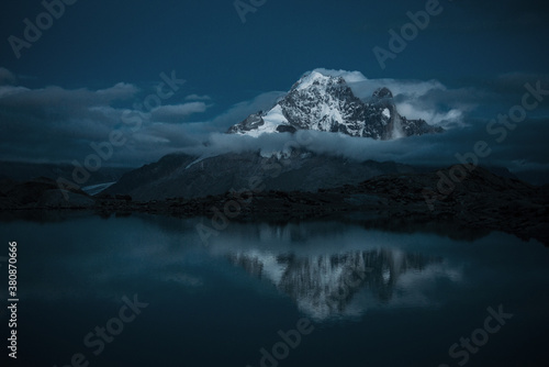 Wallpaper Mural HIgh mountain peaks reflected in the lake at dawn Torontodigital.ca