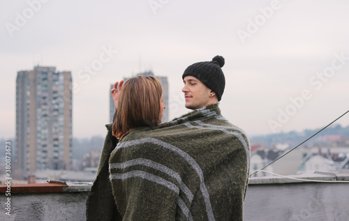 Couple on the roof photo