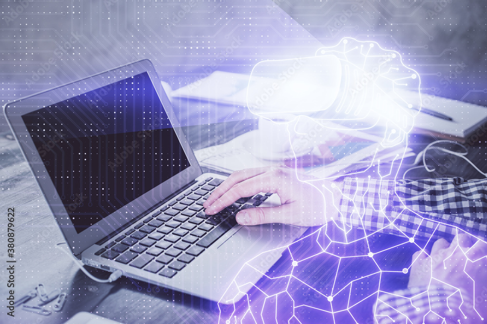 AR hologram with man working on computer on background. Augmented reality concept. Double exposure. AR hologram with man working on computer on background. Augmented reality concept. Double exposure.