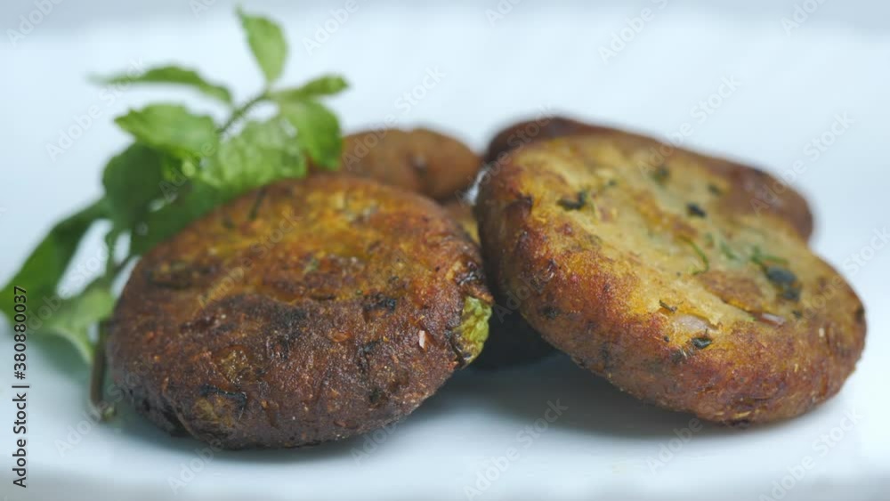 Traditional Indian Aloo Tikki Recipe close-up - food recipes Traditional Indian Aloo Tikki Recipe close-up - food recipes
