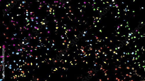 Colorful petard explosions. Confetti falling down on the black background 