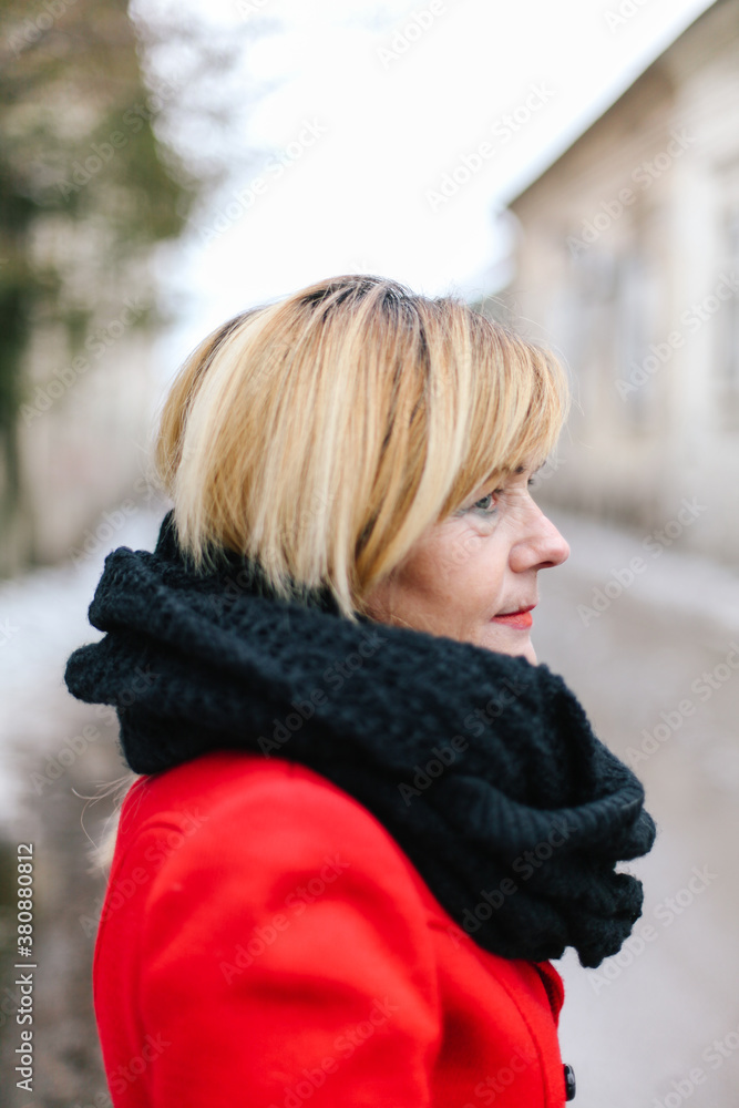 Portrait of a beautiful blonde woman in the street Portrait of a beautiful blonde woman in the street