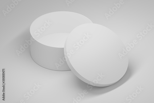 Two round white boxes with blank white surfaces on white background