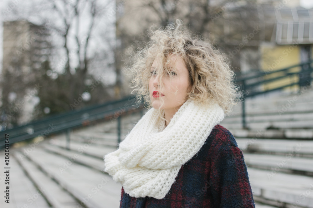 Portrait of a young beautiful curl model in winter clothes Portrait of a young beautiful curl model in winter clothes
