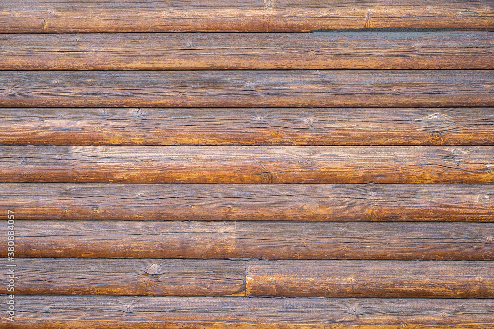 Braune Holzlatten als Verkleidung für eine urige Fassade Braune Holzlatten als Verkleidung für eine urige Fassade