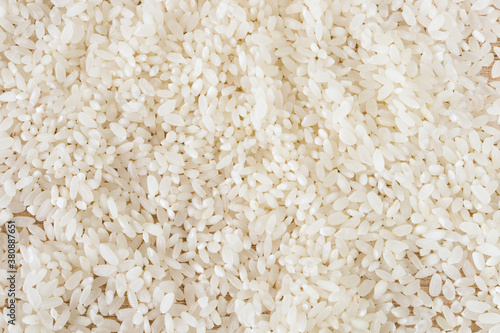 White rice background and texture. Rice grain. View from above. Close-up. macro
