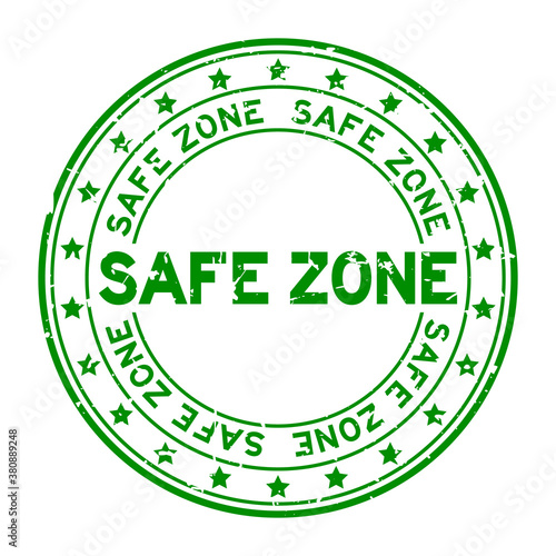 Grunge green safe zone word round rubber seal stamp on white background