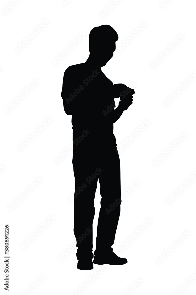 Standing man with phone silhouette vector