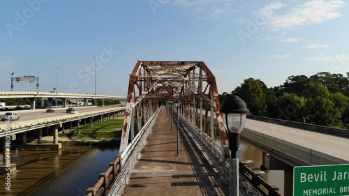 Drone Footage over Bevil Jarrell Walking Bridge and Hwy 59/I-69 which Crosses the San Jacinto River in Humble, Texas in North Houston photo