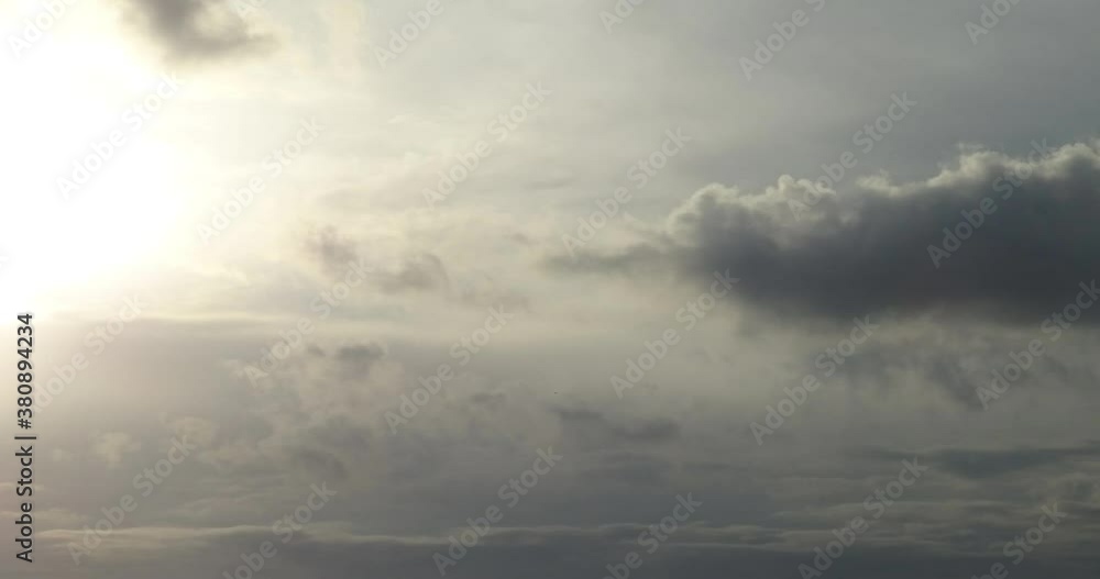 Timelapse of an aircraft followed by dark stormy clouds while night comes. Timelapse of an aircraft followed by dark stormy clouds while night comes.
