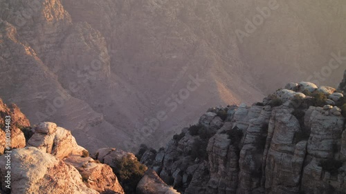 Dana valley, rocky valley with sunset . Dana nature reserve, Jordan. pan left. 4K photo