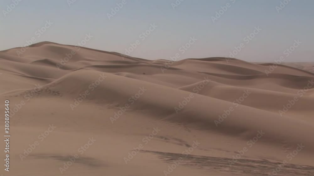 Pan shot of North Algodones Dunes in California in the midday heat, USA. Pan shot of North Algodones Dunes in California in the midday heat, USA.