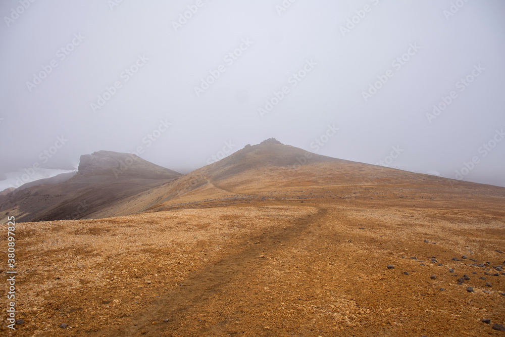 Foggy yellow mountain path at Landmannalaugar, Iceland