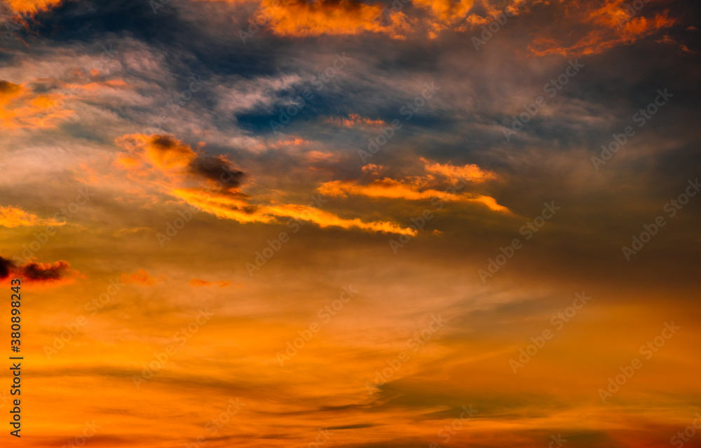 Beautiful sunset sky. Orange clouds