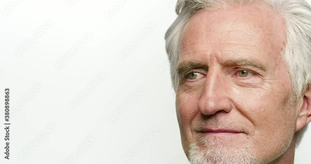 Portrait of a happy man against a white background Portrait of a happy man against a white background