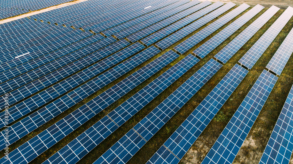 Solar panels in aerial view. Solar panels system power generators from sun Solar panels in aerial view. Solar panels system power generators from sun