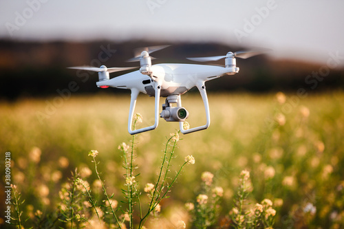 drone quad copter on yellow field