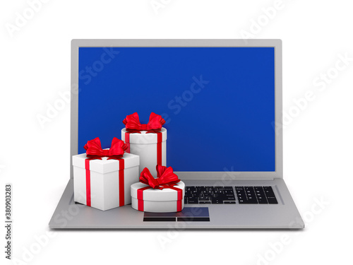 laptop and gift boxes on wh...