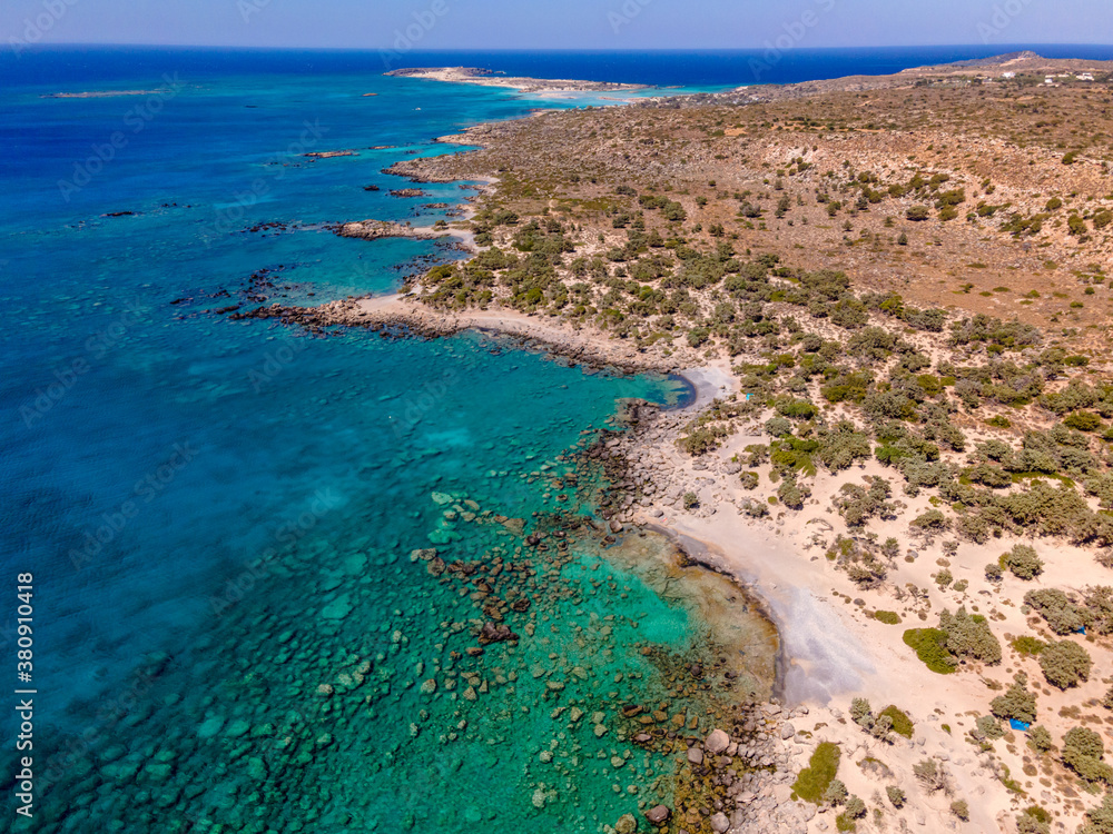 Crete Coast Line with turquoise colored water and lonely Beach from Top 