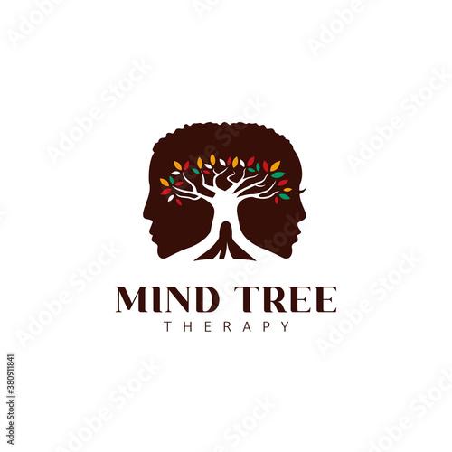 Mind tree therapy psychologist logo icon with male and female silhouette and big tree with colorful leaves
