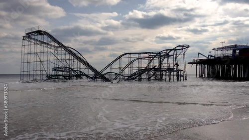 After Hurricane Sandy, the historic Jetstar roller coaster sits in the Atlantic Ocean. photo