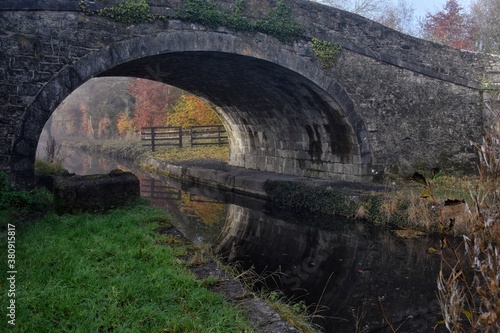 Old Bridge at Foggy Canal