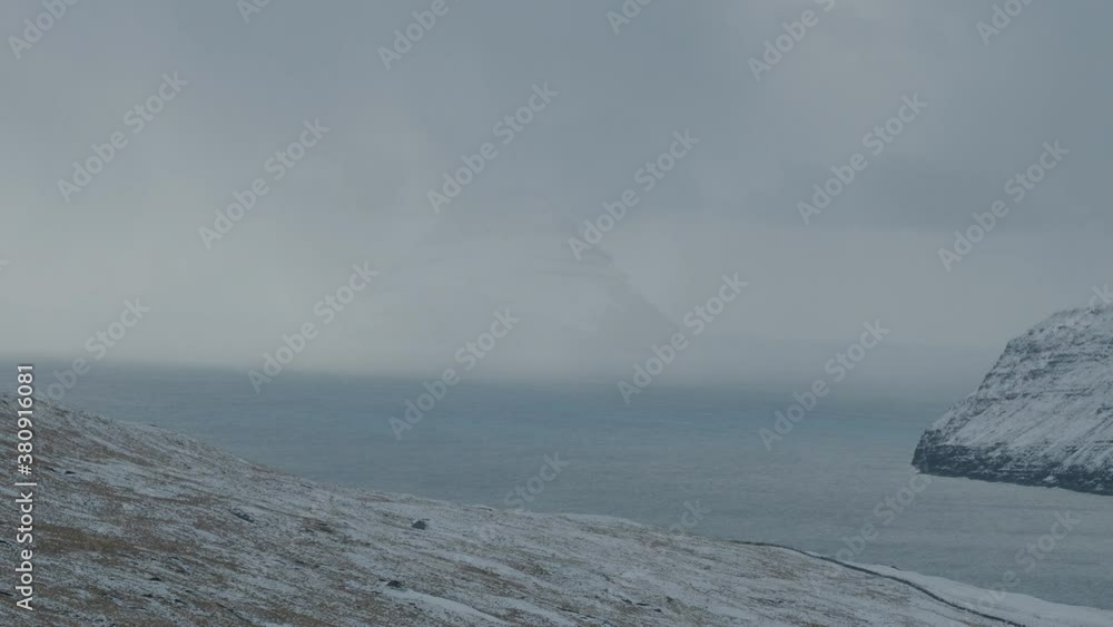 Dramatic winter views of the Faroe Islands scenery landscape Dramatic winter views of the Faroe Islands scenery landscape