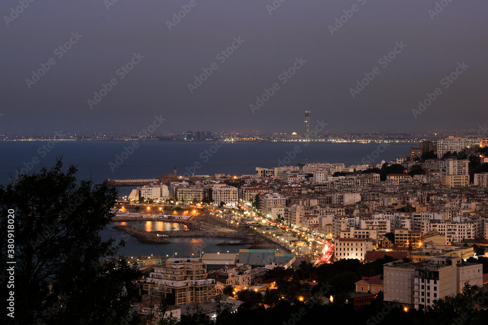 High cityscape on algiers coast in a cloudy night