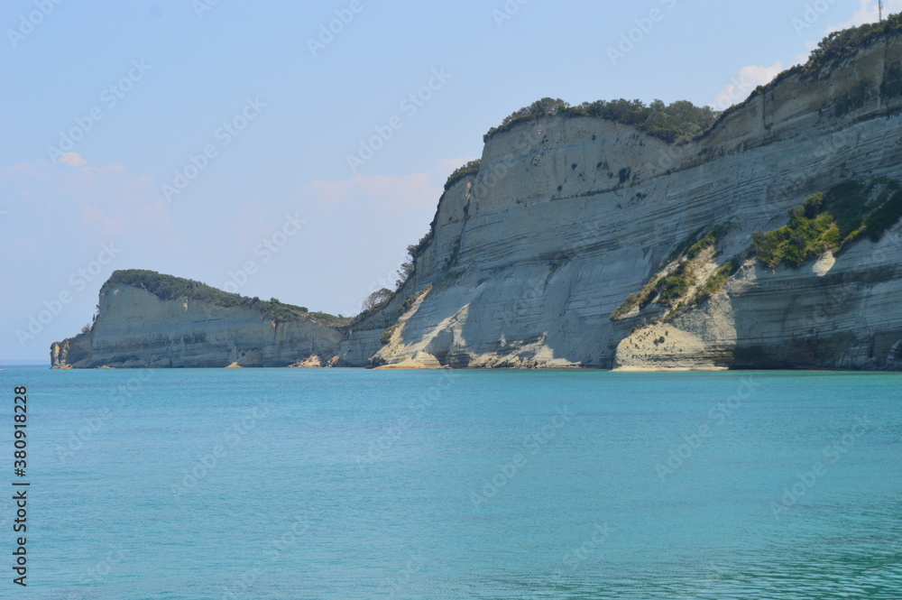 Fototapeta premium The beautiful turquoise ocean in the Ionian Sea surrounding the island of Corfu, Greece