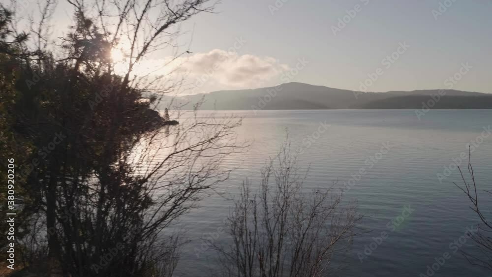 Beautiful morning hike around a lake at sunrise, with breathtaking views and a peaceful atmosphere. Beautiful morning hike around a lake at sunrise, with breathtaking views and a peaceful atmosphere.