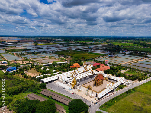 Nakhon Pathom / Thailand / August 09,2020 : Wat Charoen Rat Bamrung. The temple is very beautiful, the whole church And the Buddha statue in front of the magnificent temple © Kridsadar