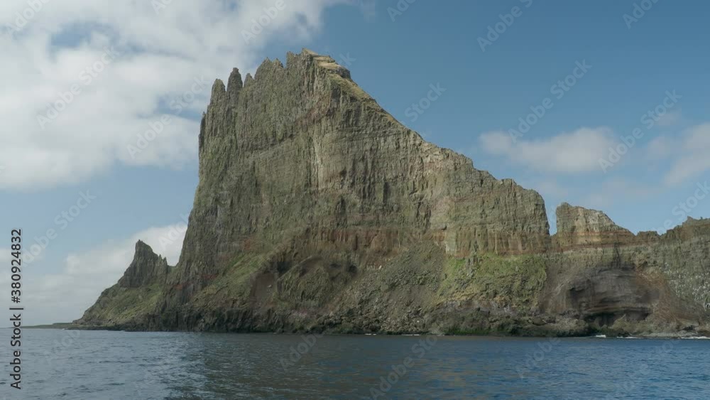 Dramatic rock cliff scenery Faroe Islands in the ocean Dramatic rock cliff scenery Faroe Islands in the ocean
