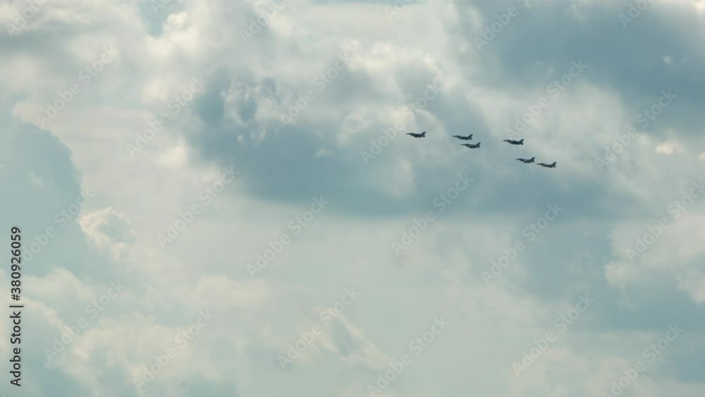 Five jets flying over the clouds on the NATO conference day in Warsow Five jets flying over the clouds on the NATO conference day in Warsow