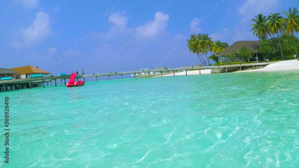 Maldives clear tropical water and sandy beach at a nice resort Maldives clear tropical water and sandy beach at a nice resort