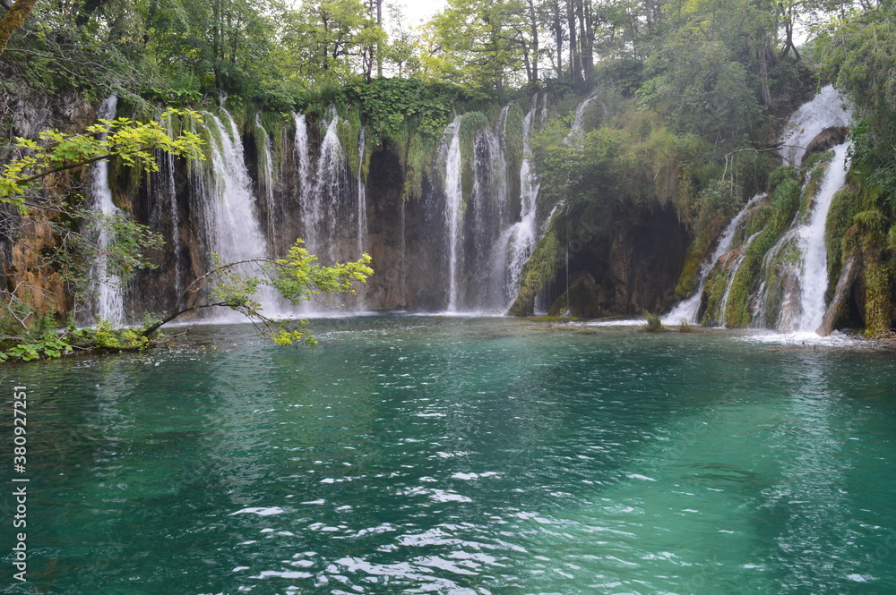 The turquoise waters from the stunning waterfalls in the Plitvice Lakes National Park in Croatia The turquoise waters from the stunning waterfalls in the Plitvice Lakes National Park in Croatia