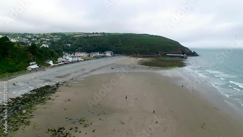 Aerial drone flight along the beach at Laxey, Isle of Man, United Kingdom. photo