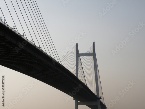 Fototapeta Naklejka Na Ścianę i Meble -  Second Hooghly Bridge in Kolkata, its a very known landmark for the city of Calcutta.