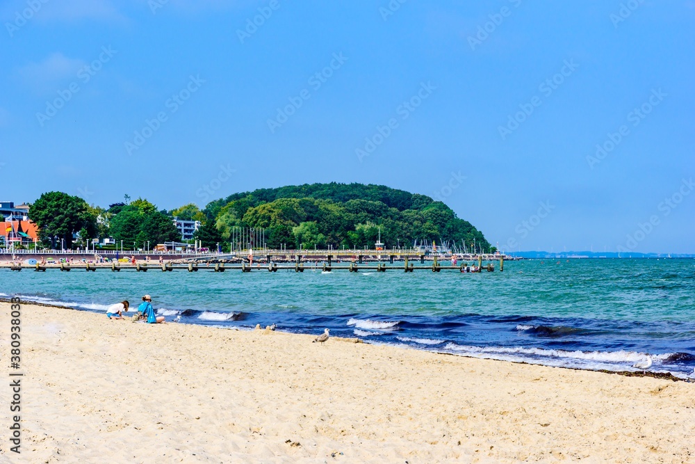 Beach in Lubeck - Travemunde (Travemünde) on baltic sea. Schleswig-Holstein, Germany. Beach in Lubeck - Travemunde (Travemünde) on baltic sea. Schleswig-Holstein, Germany.