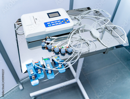 Photography Vacuum sensors for recording ECG or ECG-cardiogram in doctor`s hands
