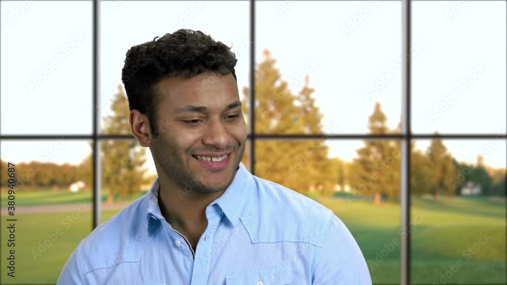 Close up happy daydreaming young man. Smiling young man daydreams and looks up. Close up happy daydreaming young man. Smiling young man daydreams and looks up.